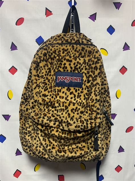 jansport fuzzy cheetah print backpack.